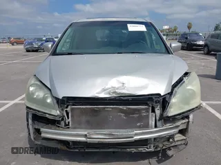 2005 Honda Odyssey EX-L with VIN 5FNRL38745B075486, listed as a IAAI auction lot 42080772 with 197,158 mi miles and . Bid and sale history available at DreamBid. Image 12.