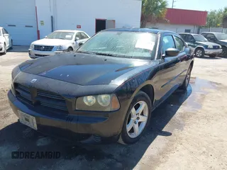 2008 Dodge Charger with VIN 2B3KA43R58H144448, listed as a IAAI auction lot 42015594 with 199,886 mi miles and . Bid and sale history available at carsss.com. Image 2.