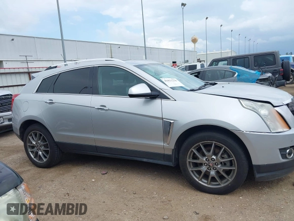 2015 Cadillac SRX Performance Collection z VIN 3GYFNCE36FS633386, wystawiony jako IAAI lot #41851338 z przebiegiem 102 586 mil mil oraz . Historia ofert i sprzedaży dostępna na DreamBid. Obrazek 13.