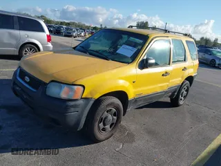 2002 Ford Escape XLS Choice with VIN 1FMYU01132KD56671, listed as a IAAI auction lot 41552541 with 245,923 mi miles and . Bid and sale history available at DreamBid. Image 2.