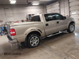2004 Ford F-150 XLT with VIN 1FTPW14504KD59559, listed as a IAAI auction lot 41671633 with 196,328 mi miles. Bid and sale history available at carsss.com. Image 4.