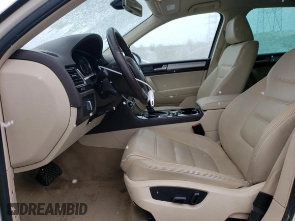 2011 Volkswagen Touareg Sport with VIN WVGFF9BP8BD002982, listed as a Copart auction lot 53958555 with 156,742 mi miles and Salvage Title. Bid and sale history available at DreamBid. Image 7.