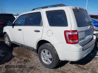 2009 Ford Escape XLS with VIN 1FMCU02729KA51377, listed as a IAAI auction lot 41404063 with 104,582 mi miles and . Bid and sale history available at DreamBid. Image 3.