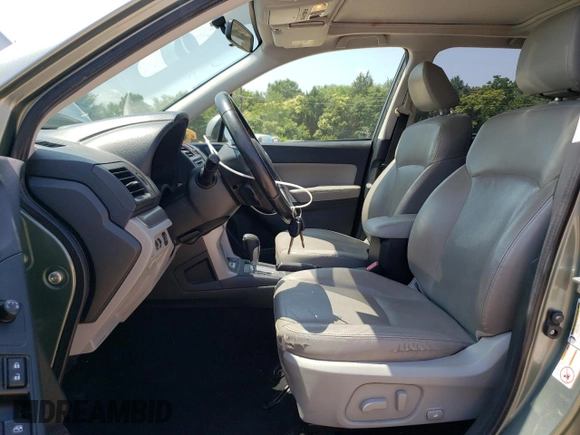 2014 Subaru Forester Touring with VIN JF2SJAMC4EH404204, listed as a Copart auction lot 60196965 with 200,292 mi miles and Salvage title. Bid and sale history available at DreamBid. Image 7.