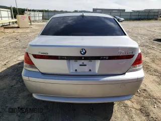 2003 BMW 7 Series 745i with VIN WBAGL63473DP68267, listed as a Copart auction lot 69923064 with 100,468 mi miles and Salvage title. Bid and sale history available at DreamBid. Image 6.