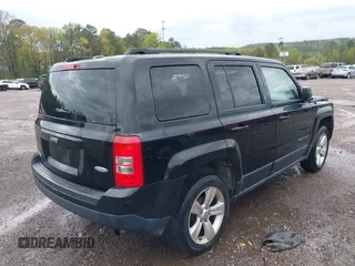 2014 Jeep Patriot Latitude with VIN 1C4NJPFA4ED650283, listed as a IAAI auction lot 41918256 with 160,598 mi miles and . Bid and sale history available at carsss.com. Image 4.