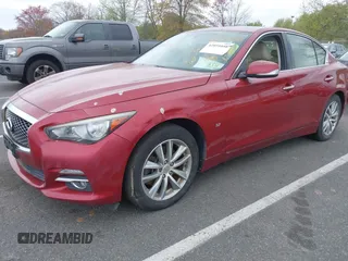 2014 Infiniti Q50 Sport with VIN JN1BV7AR1EM701939, listed as a IAAI auction lot 42051058 with 142,258 mi miles and . Bid and sale history available at DreamBid. Image 2.