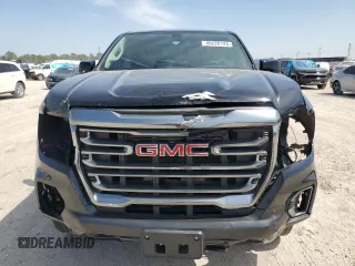 2021 GMC Canyon 4WD AT4 w/Leather with VIN 1GTG6FEN3M1274409, listed as a Copart auction lot 49228145 with 57,194 mi miles and Salvage Title. Bid and sale history available at carsss.com. Image 5.