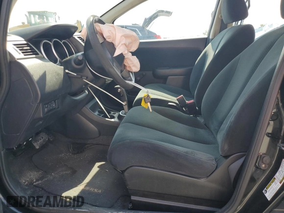 2011 Nissan Versa S z VIN 3N1BC1CP8BL430043, wystawiony jako Copart lot #64545855 z przebiegiem 146 566 mil mil oraz Szkoda całkowita • Salvage title. Historia ofert i sprzedaży dostępna na DreamBid. Obrazek 7.