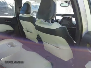2021 Toyota Prius L Eco z VIN JTDKAMFUXM3142402, wystawiony jako IAAI lot #41665484 z przebiegiem 67 416 mil mil oraz . Historia ofert i sprzedaży dostępna na DreamBid. Obrazek 8.