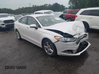 2018 Ford Fusion SE z VIN 3FA6P0H75JR159448, wystawiony jako IAAI lot #42262839 z przebiegiem 144 353 mil mil oraz . Historia ofert i sprzedaży dostępna na DreamBid. Obrazek 1.