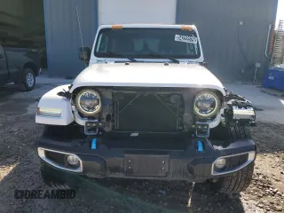 2023 Jeep Wrangler Sahara z VIN 1C4JJXP6XPW696247, wystawiony jako Copart lot #54222575 z przebiegiem 39 797 mil mil oraz Nie do naprawy • Non repairable. Historia ofert i sprzedaży dostępna na DreamBid. Obrazek 5.
