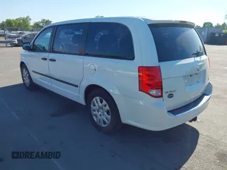 2015 Dodge Grand Caravan SE with VIN 2C4RDGBGXFR569435, listed as a IAAI auction lot 42057084 with 160,058 mi miles and . Bid and sale history available at DreamBid. Image 3.