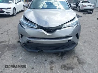 2019 Toyota C-HR XLE with VIN NMTKHMBX8KR093044, listed as a IAAI auction lot 41939036 with 60,130 mi miles. Bid and sale history available at carsss.com. Image 6.