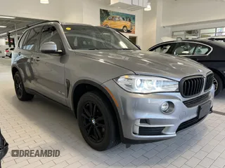 2014 BMW X5 xDrive35i z VIN 5UXKR0C50E0C27171, wystawiony jako IAAI lot #42528290 z przebiegiem 140 896 mil mil oraz . Historia ofert i sprzedaży dostępna na DreamBid. Obrazek 1.