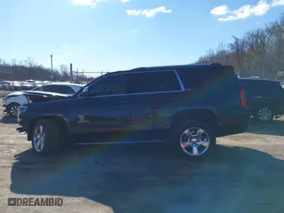 2015 Chevrolet Tahoe LTZ with VIN 1GNSKCKC6FR190314, listed as a IAAI auction lot 41672237 with 176,439 mi miles. Bid and sale history available at carsss.com. Image 14.