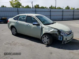 2010 Ford Focus SEL with VIN 1FAHP3HN7AW183739, listed as a Copart auction lot 55165155 with 140,967 mi miles and Salvage Title. Bid and sale history available at carsss.com. Image 4.