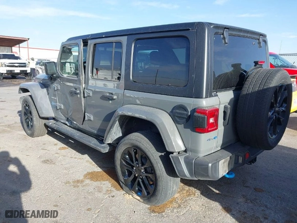 2023 Jeep Wrangler 4xe Sahara with VIN 1C4JJXP68PW661190, listed as a IAAI auction lot 41816483 with 41,877 mi miles. Bid and sale history available at carsss.com. Image 3.