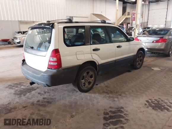 2003 Subaru Forester X with VIN JF1SG63653H762212, listed as a IAAI auction lot 41841892 with 152,059 mi miles. Bid and sale history available at carsss.com. Image 4.