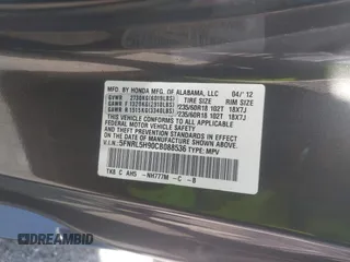 2012 Honda Odyssey Touring with VIN 5FNRL5H90CB088536, listed as a IAAI auction lot 42102008 with 283,350 mi miles and . Bid and sale history available at DreamBid. Image 9.