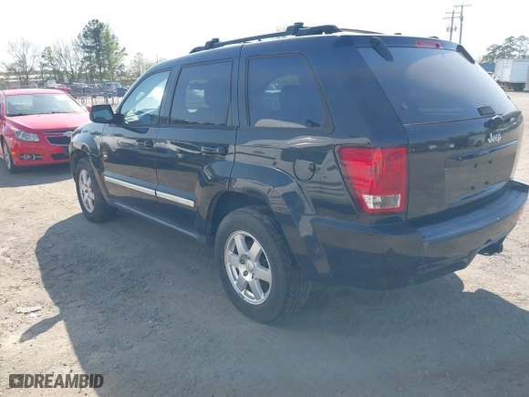 2010 Jeep Grand Cherokee Laredo with VIN 1J4PR4GK5AC120373, listed as a IAAI auction lot 42071835 with 101,949 mi miles. Bid and sale history available at carsss.com. Image 3.