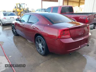 2006 Dodge Charger R/T with VIN 2B3KA53H36H260418, listed as a IAAI auction lot 42126007 with 242,331 mi miles and . Bid and sale history available at carsss.com. Image 3.