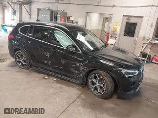 2016 BMW X1 xDrive28i with VIN WBXHT3C34GP884207, listed as a IAAI auction lot 41686036 with 122,406 mi miles. Bid and sale history available at carsss.com. Image 1.