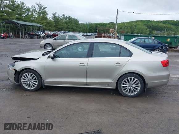 2014 Volkswagen Jetta TDI w/Premium/Nav with VIN 3VWLL7AJ9EM226026, listed as a IAAI auction lot 42219871 with 100,386 mi miles and . Bid and sale history available at DreamBid. Image 14.