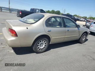 1997 Nissan Maxima GXE с VIN JN1CA21D5VT811907, выставлен на аукционе Copart как лот 60270405 с пробегом 71 723 миль миль и Чистый • Clean title. История ставок и продаж доступна на DreamBid. Изображение 3.