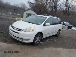 2004 Toyota Sienna XLE with VIN 5TDZA22C94S103248, listed as a IAAI auction lot 41276855 with 186,414 mi miles and . Bid and sale history available at DreamBid. Image 2.