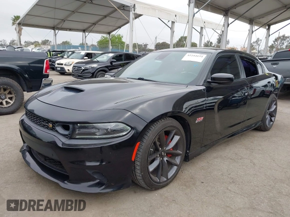 2019 Dodge Charger Scat Pack с VIN 2C3CDXGJ7KH717796, выставлен на аукционе IAAI как лот 42244154 с пробегом 84 385 миль миль и . История ставок и продаж доступна на DreamBid. Изображение 19.