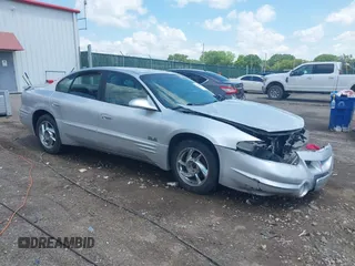 2001 Pontiac Bonneville SLE z VIN 1G2HY54K014256898, wystawiony jako IAAI lot #42202409 z przebiegiem 154 300 mil mil oraz . Historia ofert i sprzedaży dostępna na DreamBid. Obrazek 1.