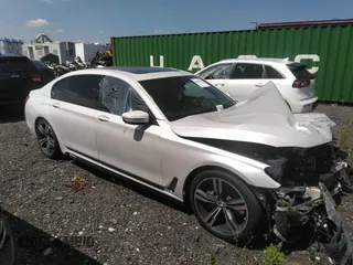 2017 BMW 7 Series 750i with VIN WBA7F0C35HGM21649, listed as a IAAI auction lot 37362691 with 10,000 mi miles and . Bid and sale history available at DreamBid. Image 13.