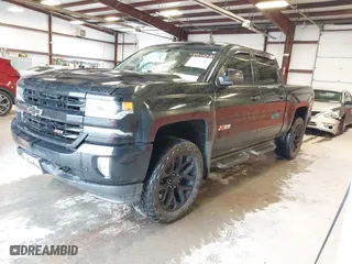 2017 Chevrolet Silverado 1500 LTZ with VIN 3GCUKSEC6HG300689, listed as a IAAI auction lot 41940491 with 165,998 mi miles. Bid and sale history available at carsss.com. Image 2.