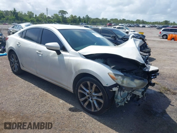 2015 Mazda 6 i Touring with VIN JM1GJ1V5XF1218908, listed as a IAAI auction lot 42449941 with Not provided miles and . Bid and sale history available at DreamBid. Image 1.