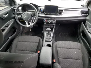 2023 Kia Rio S with VIN 3KPA24AD3PE517933, listed as a Copart auction lot 41072394 with 26,058 mi miles and Salvage Title. Bid and sale history available at DreamBid. Image 8.