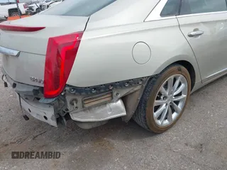 2013 Cadillac XTS Luxury with VIN 2G61P5S30D9132193, listed as a IAAI auction lot 41897709 with 140,780 mi miles and . Bid and sale history available at DreamBid. Image 18.