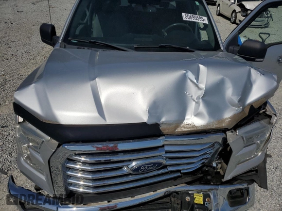 2016 Ford F-150 XL with VIN 1FTEW1CG4GKD40804, listed as a Copart auction lot 50699595 with 116,489 mi miles and Salvage Title. Bid and sale history available at DreamBid. Image 11.