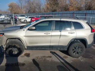 2015 Jeep Cherokee Latitude with VIN 1C4PJMCS4FW578401, listed as a IAAI auction lot 41014082 with 127,465 mi miles. Bid and sale history available at carsss.com. Image 14.