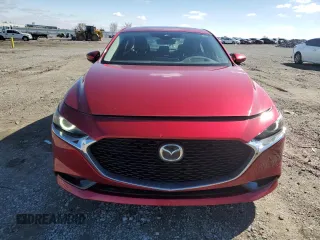 2019 Mazda 3 Premium with VIN 3MZBPAEMXKM103980, listed as a Copart auction lot 47821985 with 95,329 mi miles and Salvage Title. Bid and sale history available at DreamBid. Image 5.