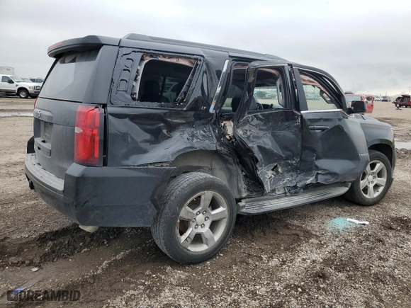 2019 Chevrolet Tahoe LT with VIN 1GNSCBKC6KR254630, listed as a Copart auction lot 50657345 with 111,297 mi miles and Salvage Title. Bid and sale history available at carsss.com. Image 3.