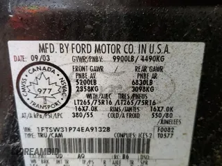 2004 Ford F-350 XL with VIN 1FTSW31P74EA91328, listed as a Copart auction lot 85856984 with 291,033 mi miles and Salvage Title. Bid and sale history available at DreamBid. Image 12.