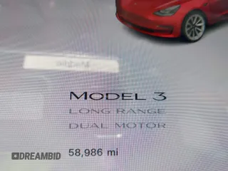 2021 Tesla Model 3 Long Range with VIN 5YJ3E1EB6MF054361, listed as a IAAI auction lot 42105247 with 58,986 mi miles and . Bid and sale history available at carsss.com. Image 15.