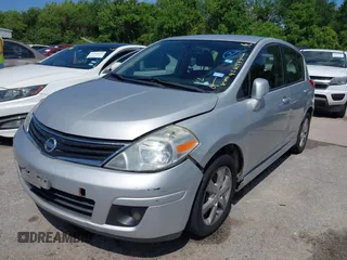 2012 Nissan Versa S with VIN 3N1BC1CP3CK253098, listed as a IAAI auction lot 42111977 with 180,210 mi miles. Bid and sale history available at carsss.com. Image 2.