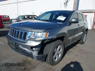 2011 Jeep Grand Cherokee Laredo with VIN 1J4RR4GG9BC714325, listed as a IAAI auction lot 41560915 with 153,372 mi miles and . Bid and sale history available at DreamBid. Image 17.