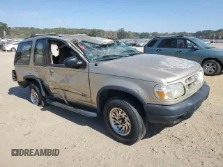 2000 Ford Explorer Sport with VIN 1FMYU60E3YUA95157, listed as a Copart auction lot 77214804 with 322,604 mi miles and Salvage title. Bid and sale history available at DreamBid. Image 4.