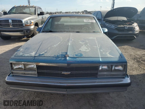 1987 Chevrolet El Camino z VIN 3GCCW80Z9HS905561, wystawiony jako Copart lot #75401604 z przebiegiem 32 958 mil mil oraz Szkoda całkowita • Salvage title. Historia ofert i sprzedaży dostępna na DreamBid. Obrazek 5.