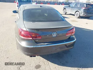 2014 Volkswagen CC Sport with VIN WVWBP7AN7EE514221, listed as a IAAI auction lot 41528930 with 140,227 mi miles and . Bid and sale history available at DreamBid. Image 6.