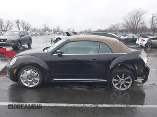 2013 Volkswagen Beetle 2.5L with VIN 3VW5P7AT8DM832656, listed as a IAAI auction lot 41729356 with 124,156 mi miles and . Bid and sale history available at DreamBid. Image 13.