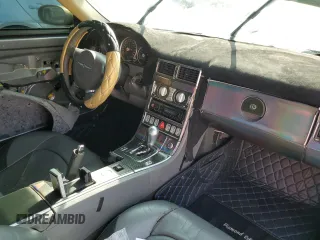2005 Chrysler Crossfire Limited z VIN 1C3AN69L05X035386, wystawiony jako Copart lot #70837984 z przebiegiem 36 500 mil mil oraz Czysty tytuł • Clean title. Historia ofert i sprzedaży dostępna na DreamBid. Obrazek 8.